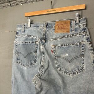 Vintage Levis 560 Mens 33x30 Light Wash Comfort Fit‎ Tapered Jeans Distressed